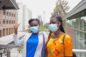 Barbara Mensah (left) and Patricia Quaye attended the same university together in Ghana but didn’t know the other had applied to the M.DevEng program. Both chose the Sustainable Design Innovations track. (Photo by Judah Marsden).