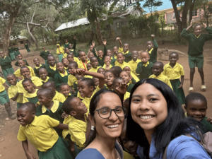 Ekta Raghuwanshi and Maria Denna with their students in Kasigau.