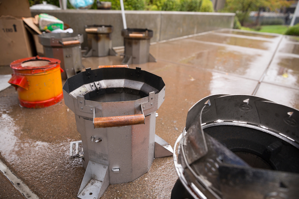 Engineered Cookstoves from class DevEng C200 placed outside on the floor